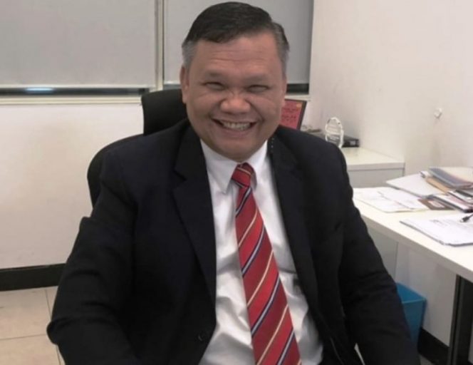 
 Komunikolog Indonesia,Dr. Emrus Sihombing
