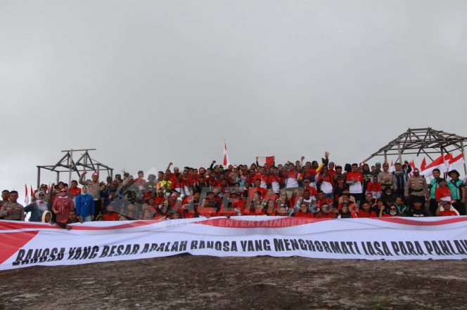 
 Sambut Hari Pahlawan Polda Papua Barat Touring Merah Putih Bersama Masyarakat