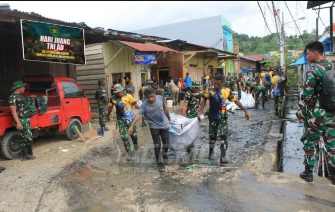 
 Jelang Hari Juang TNI AD Ke-78 Tahun, Yonif 763/SBA Bersihkan Pasar Bersama Masyarakat