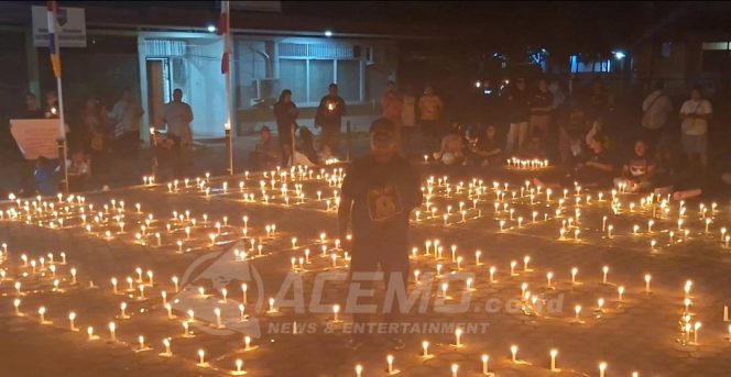 
 Aksi 1000 Lilin Untuk Yanto Idorway, Keluarga Desak Polda Papua Barat Bongkar Misteri Kematian